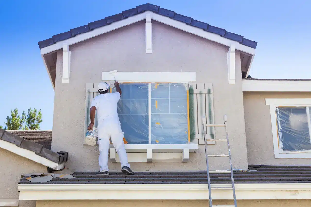 Professional Painter Working On A Home