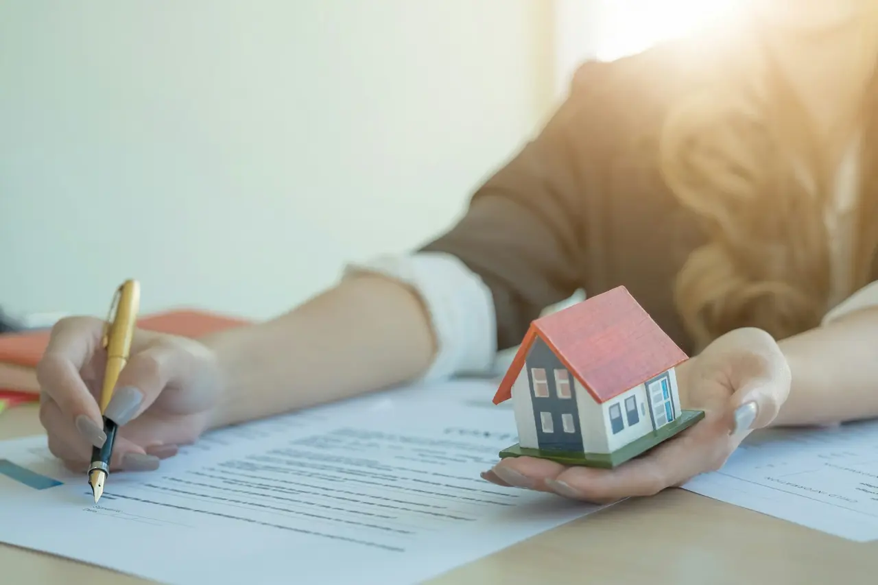 Selling Home And Signing Contracts